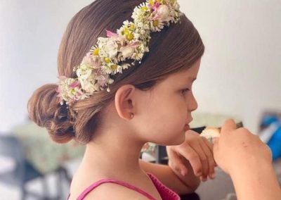Holy communion soft updo with flowers